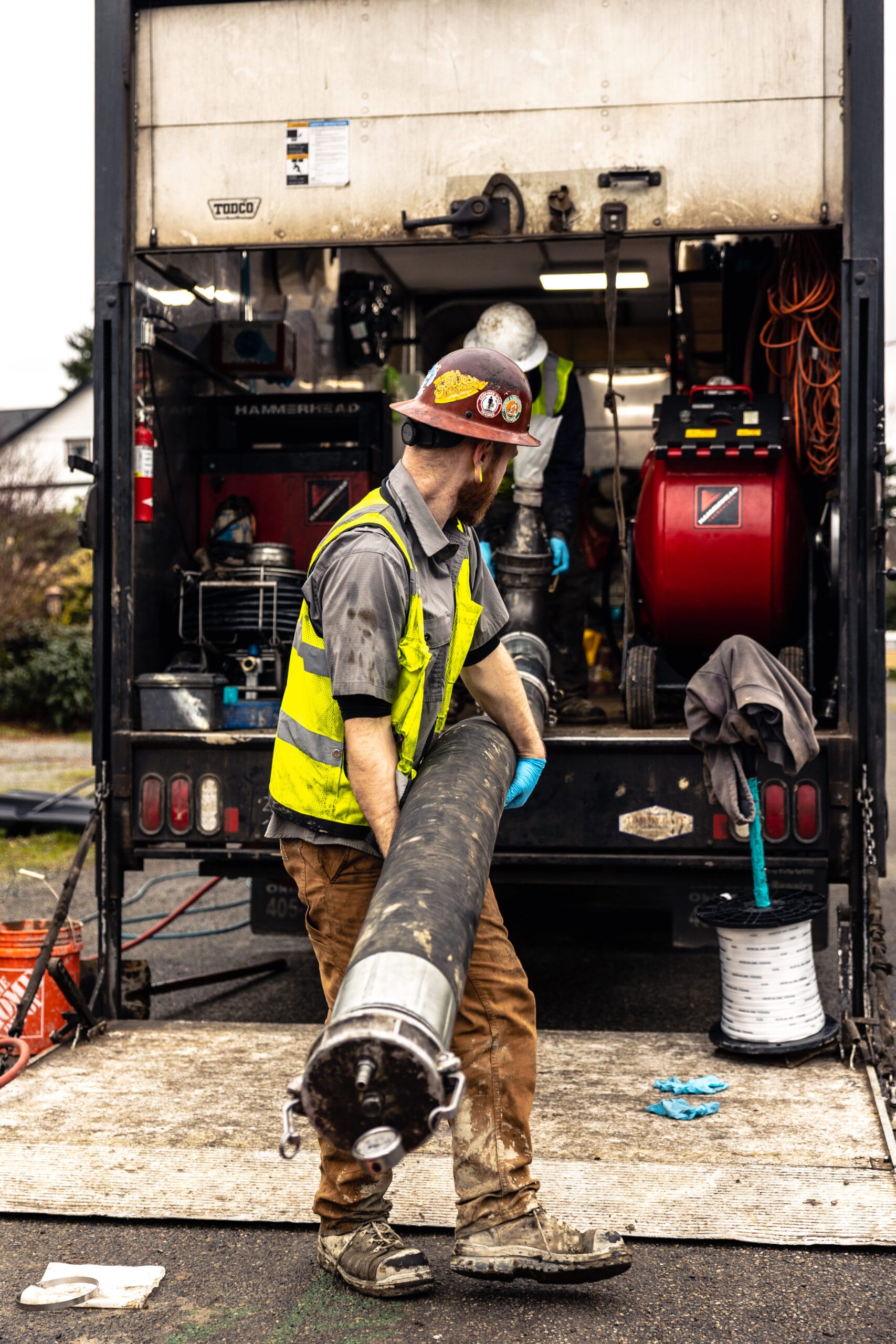 PRICOR professional plumbers getting ready to install trenchless technology equipment in Greater Puget Sound providing Seattle plumbing services.